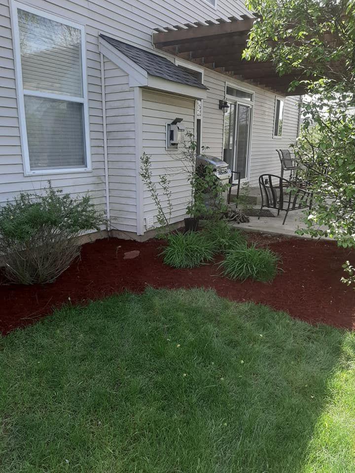Lawn care and landscaping work by Henry’s Lawn Care in Rockford, IL
