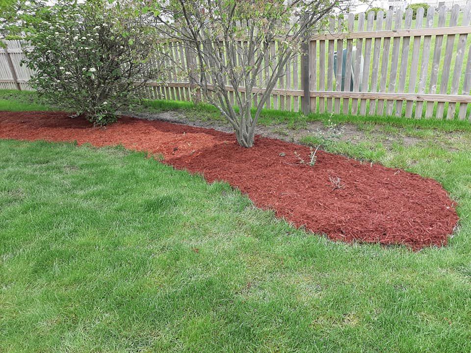 Lawn care and landscaping work by Henry’s Lawn Care in Rockford, IL
