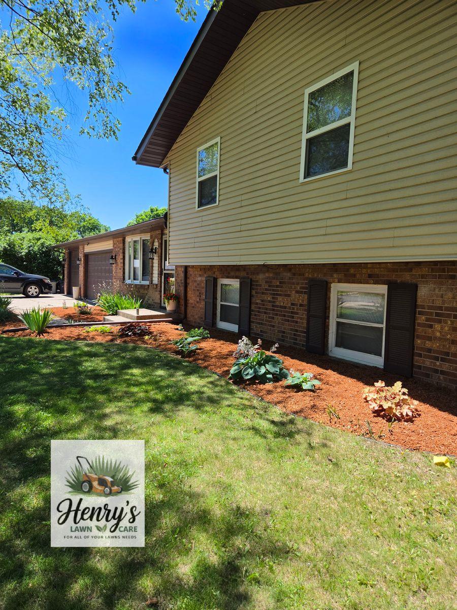 Lawn care and landscaping work by Henry’s Lawn Care in Rockford, IL