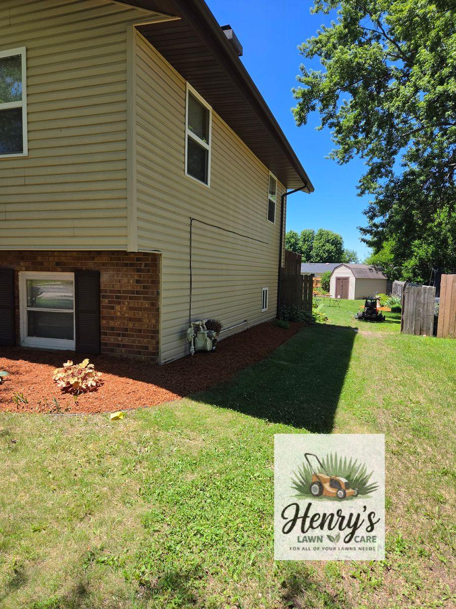 Lawn care and landscaping work by Henry’s Lawn Care in Rockford, IL