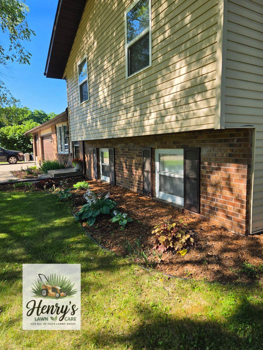 Lawn care and landscaping work by Henry’s Lawn Care in Rockford, IL