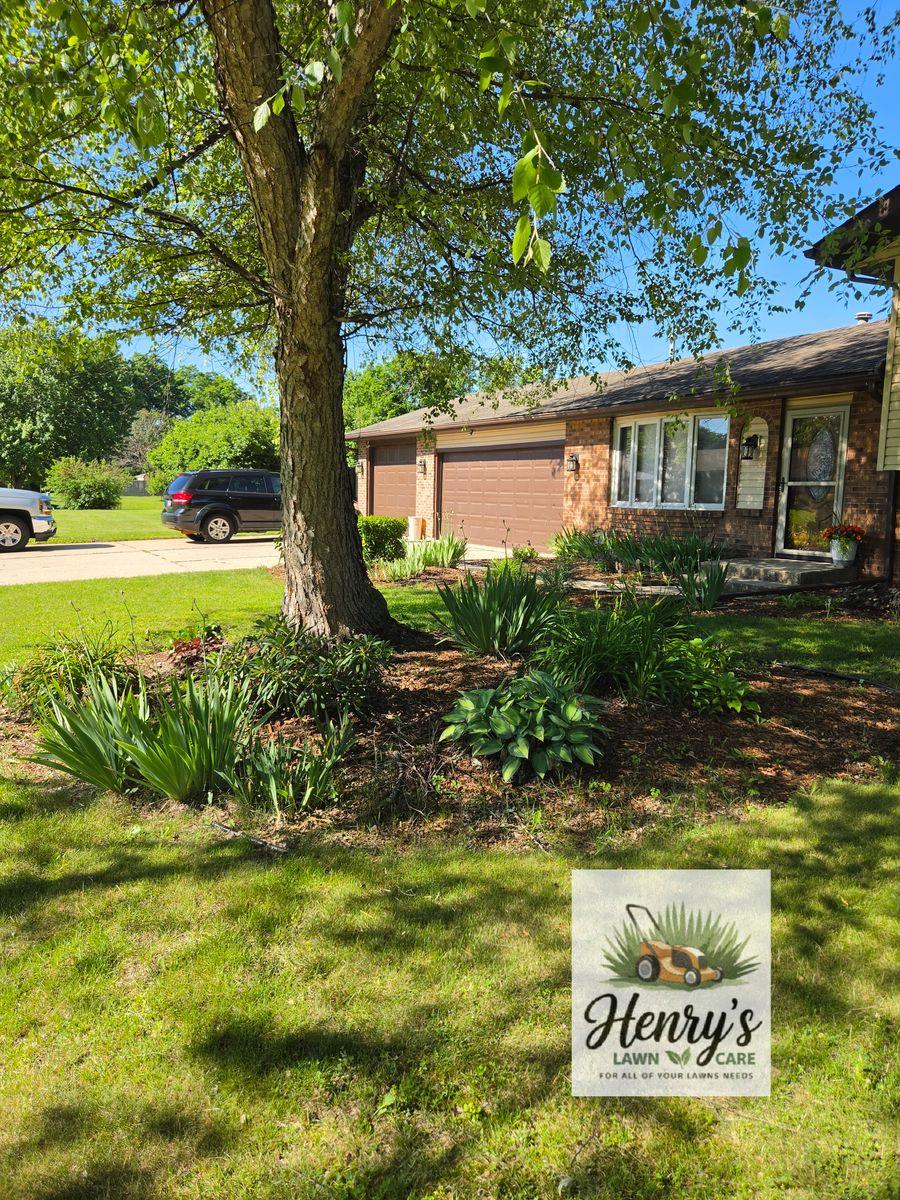 Lawn care and landscaping work by Henry’s Lawn Care in Rockford, IL