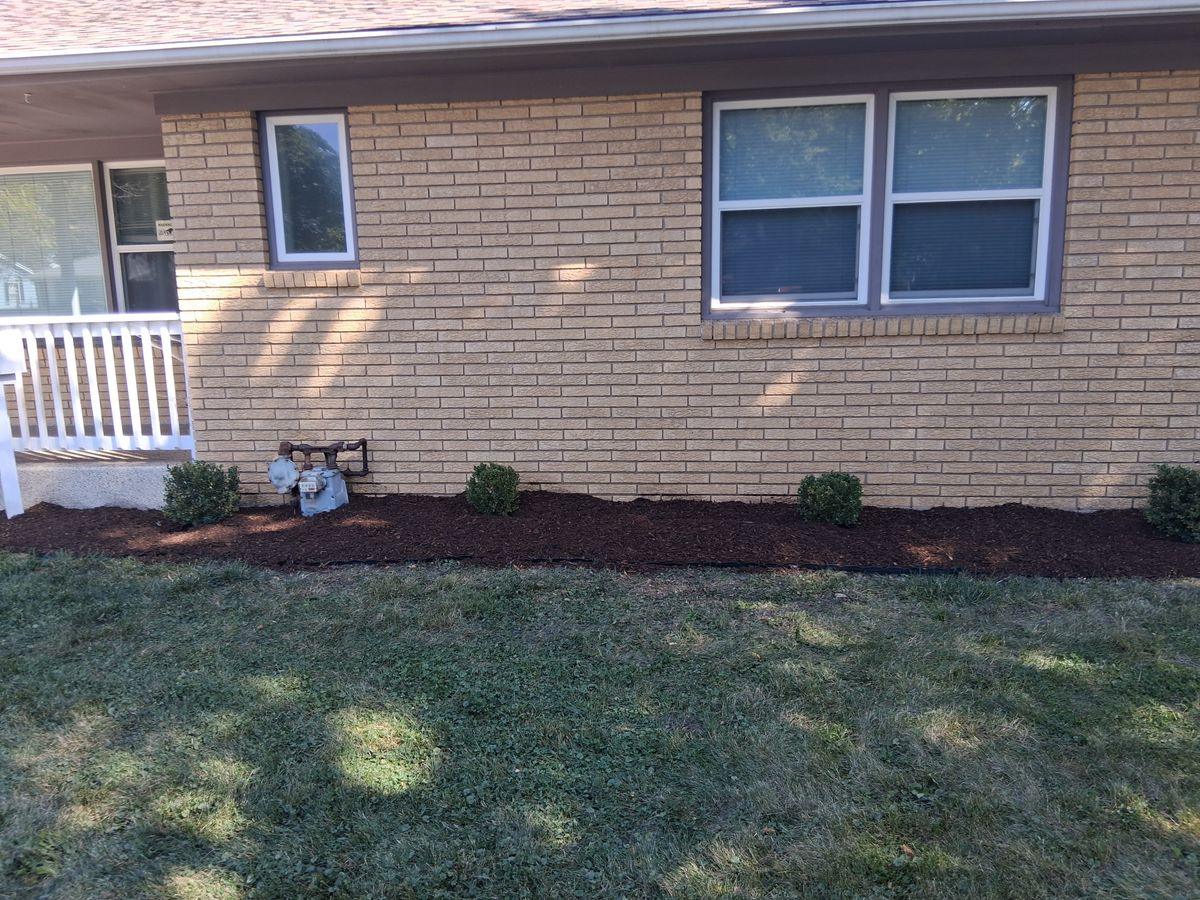 Lawn care and landscaping work by Henry’s Lawn Care in Rockford, IL